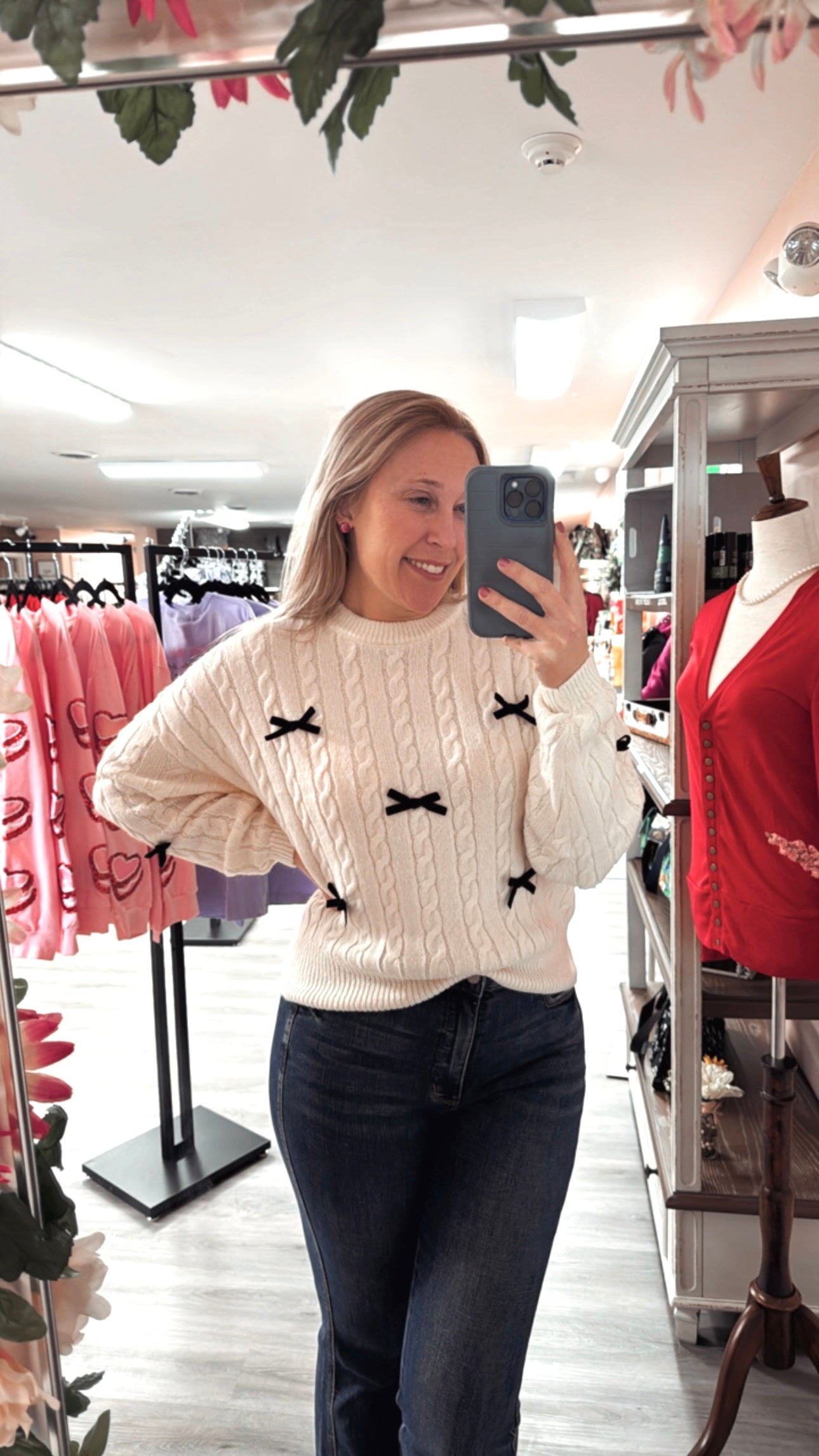 Bow sweater reg 50 now $35