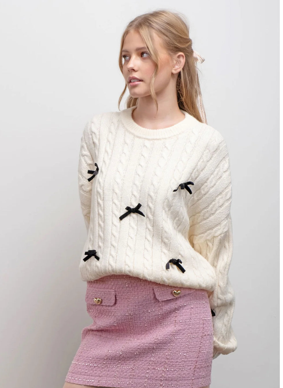 Bow sweater reg 50 now $35